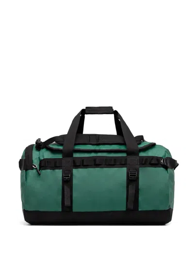 The North Face Strap Luggage Holdall In Green