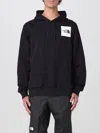 The North Face Logo Patch Drawstring Hoodie In Black