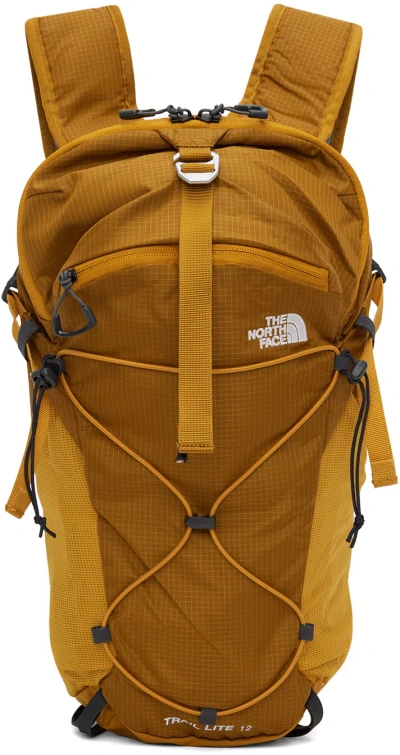 The North Face Tan Trail Lite 12 Backpack In Tea Tim Tan-citr Yel