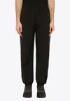 The North Face Relaxed Fit Jogging Pants Featuring Pockets In Black