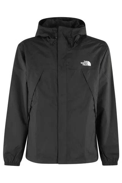 The North Face Waterproof Jacket With Drawstring Hood And Zippered Pockets In Black