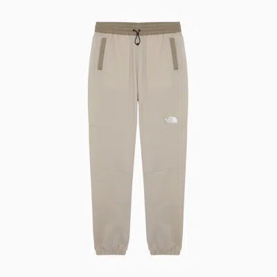 The North Face Wind Track Pants In Beige