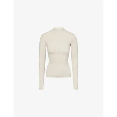 The North Face Womens  Long-sleeves Stretch-woven Top In White