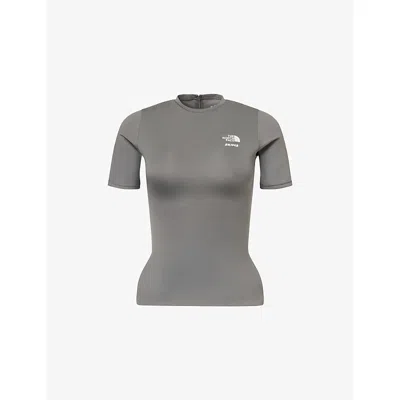 The North Face Womens  X Skims Refina Stretch-woven Short-sleeve Top In Gray