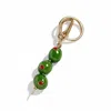 The Perfect Hoop Women's Green / Gold / Red The Extra Dirty Keychain / Green