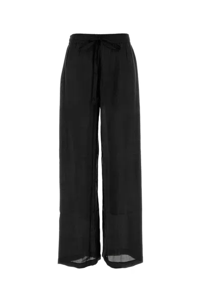 The Rose Ibiza Silk Palazzo Pants In Black