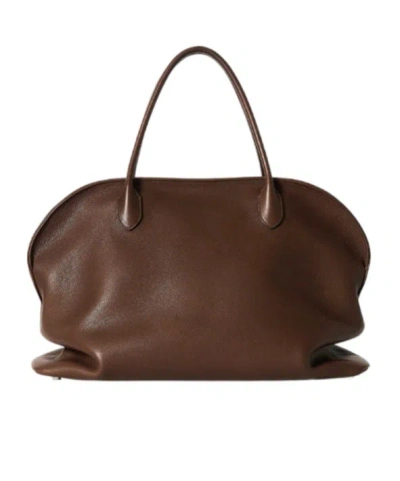 The Row Agnes 15 Hammered Saddle Leather Handbag In Brown