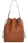 The Row Belvedere Bucket Bag In Saddle Leather In Brandy Shg