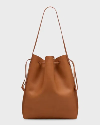 The Row Belvedere Bucket Bag In Saddle Leather In Brandy