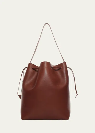 The Row Belvedere Bucket Bag In Saddle Leather In Brown
