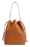 The Row Belvedere Bucket Bag In Saddle Leather In Brandy
