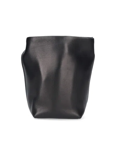 The Row "bindle" Bucket Bag In Black