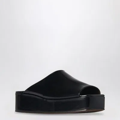 THE ROW THE ROW  BLACK EMI FLATFORM SANDALS