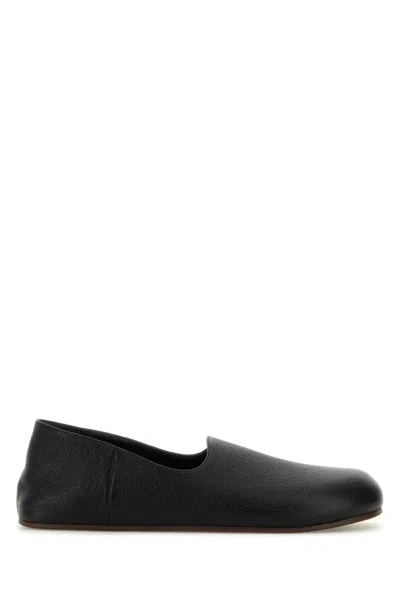 The Row Black Leather Hugh Slip-ons