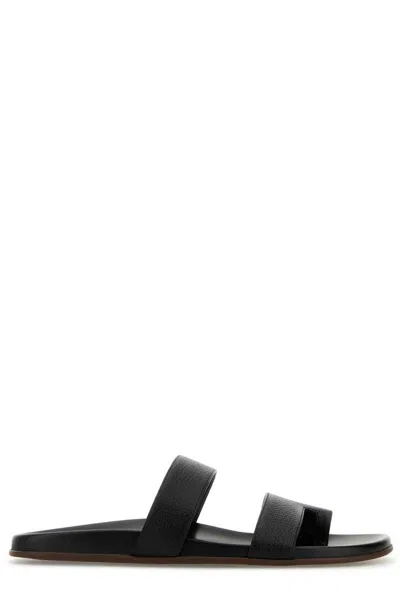 The Row Black Leather Hugh Thong Slippers