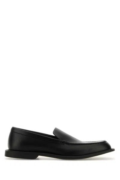 THE ROW BLACK LEATHER LOAFERS