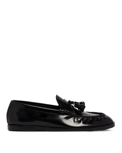 The Row Flat Sole Leather Loafers Featuring Tassel Detail In Black