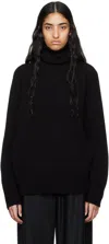 The Row Turtleneck Sweater In Blk Black