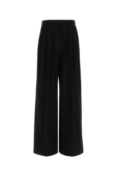 The Row Daniele Wool Wide Leg High Waist Pant In Black