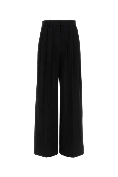 The Row Daniele Wool Wide Leg High Waist Pant In Black