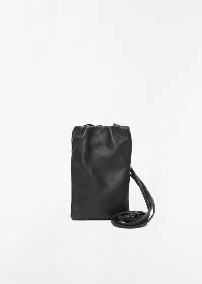 The Row Bourse Leather Phone Case In Black