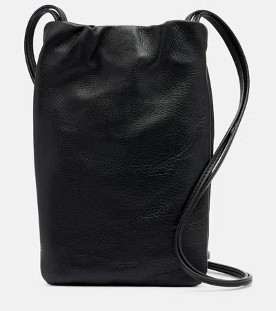 The Row Bourse Leather Phone Pouch In Black