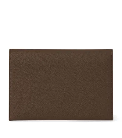 The Row Calfskin Leather Travel Pouch In Brown