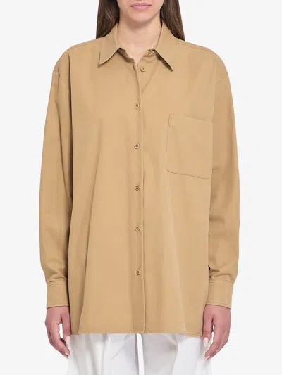 The Row Tansy Long-sleeved Shirt In Gold