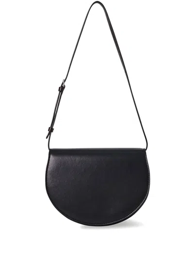 The Row Canteen Cross Body Bag In Black