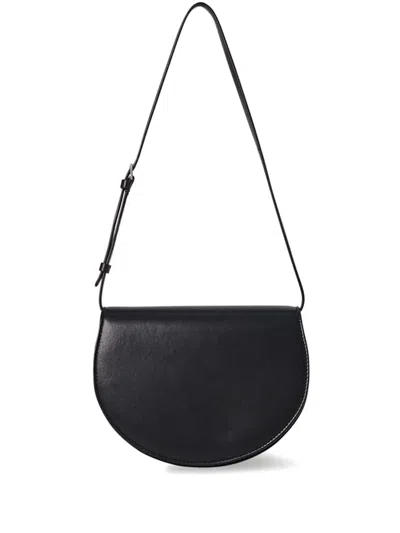 The Row Canteen Saddle Shoulder Bag In Napa Leather In Black