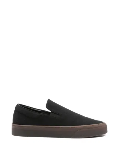 The Row Canvas Slip On Sneakers In Black