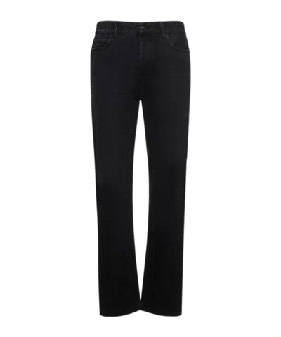 The Row Carlisle Cotton Denim Jeans In Black