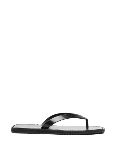 The Row City Leather Flip Flops In Black