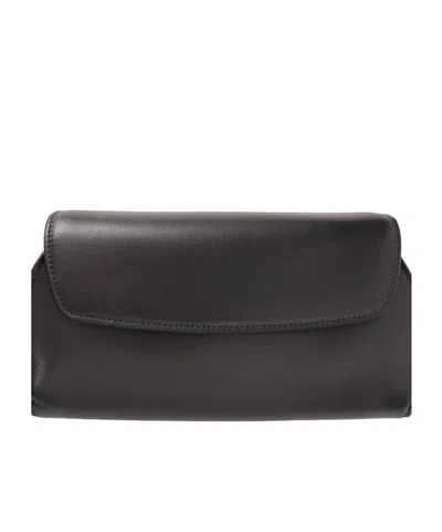 The Row Curved Leather Clutch In Black