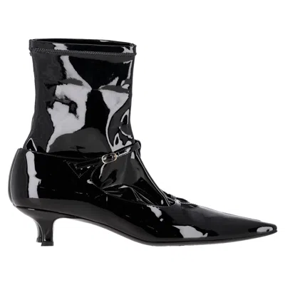THE ROW CYD ANKLE BOOTS IN BLACK PATENT LEATHER