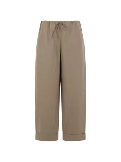 The Row Delano Cotton Trousers In Brown