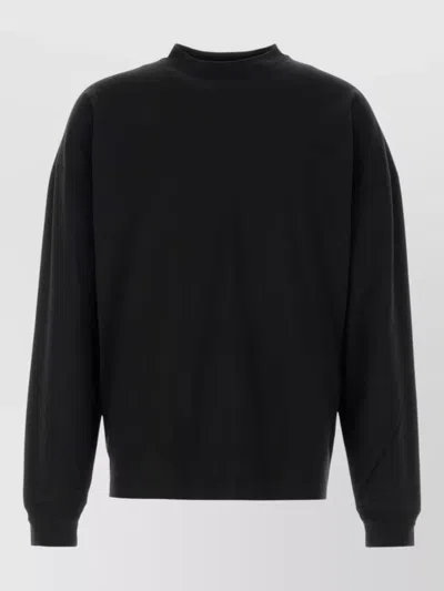 The Row Dolino Cotton Knit Long Sleeve Sweater In Black