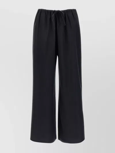 The Row Elastic Waistband Relaxed Fit Wide Leg Trousers In Black