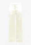 The Row Encore Satin Pants In Cream