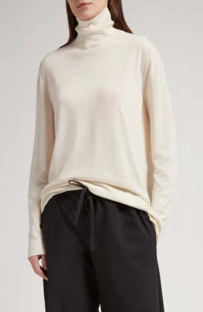 The Row Fulton Cashmere Turtleneck Jumper In Ivory