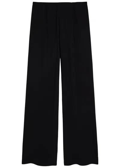 The Row Gala Wide-leg Crepe Trousers In Black