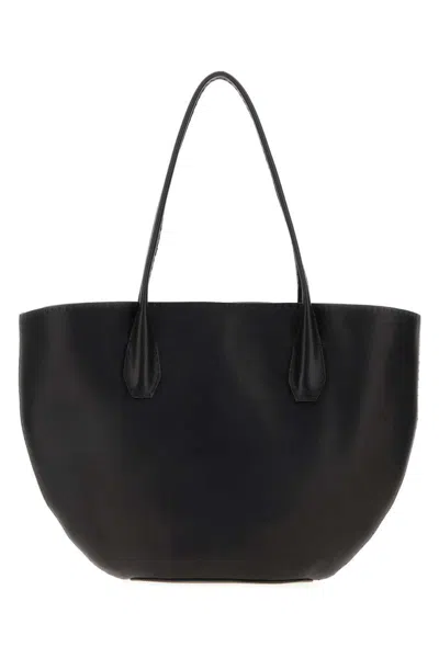 The Row Handbags. In Black