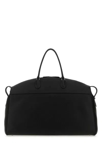 The Row Handbags. In Black