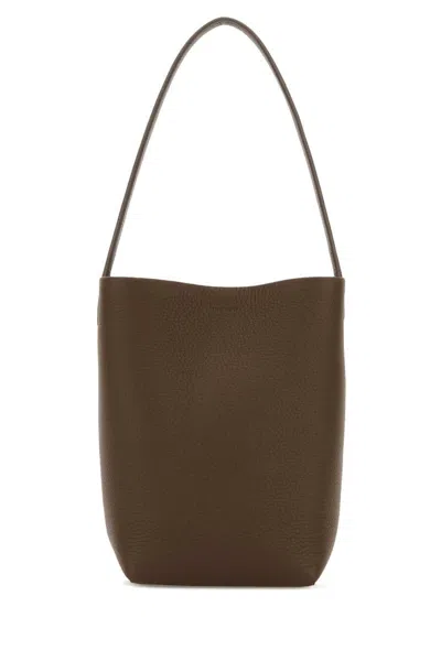 The Row Handbags. In Brown