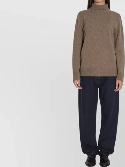 The Row Hepny Oversized Turtleneck Sweater In Brown