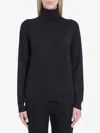The Row Heva Turtleneck Sweater In Black