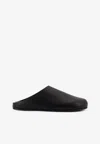 The Row Hudson Leather Relaxed Slippers In Black