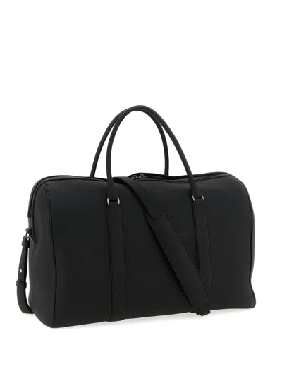 The Row Iowa Leather Travel Bag In Black