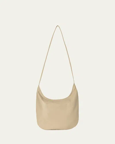 The Row Izzy North-south Crossbody Bag In Silky Leather In Sand