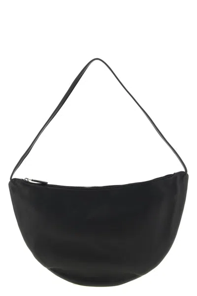 The Row Izzy Small Crescent Shoulder Bag In Leather In Black